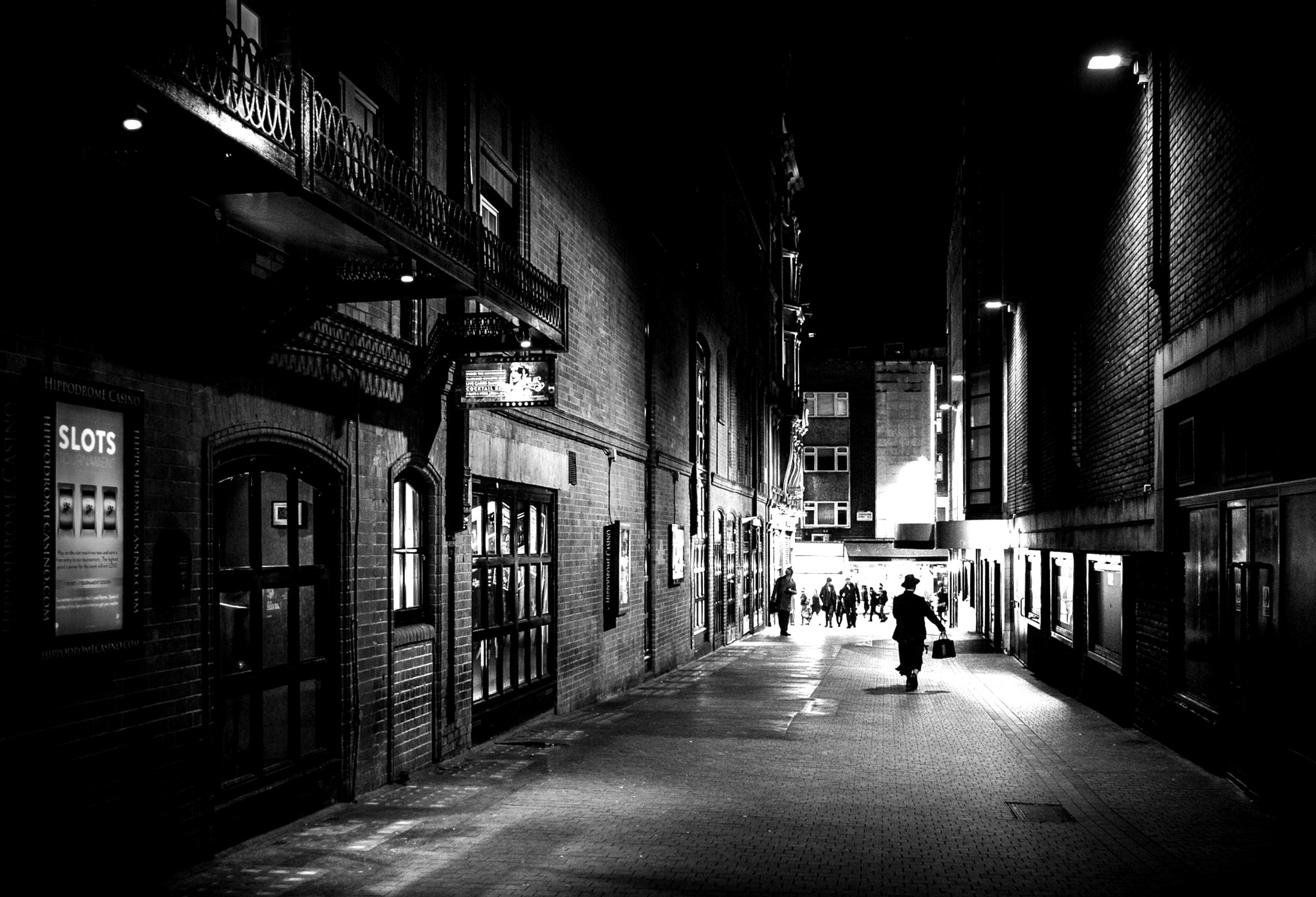 Black-and-white alley at night