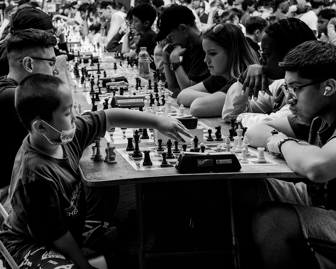 Players weighing their next chess move